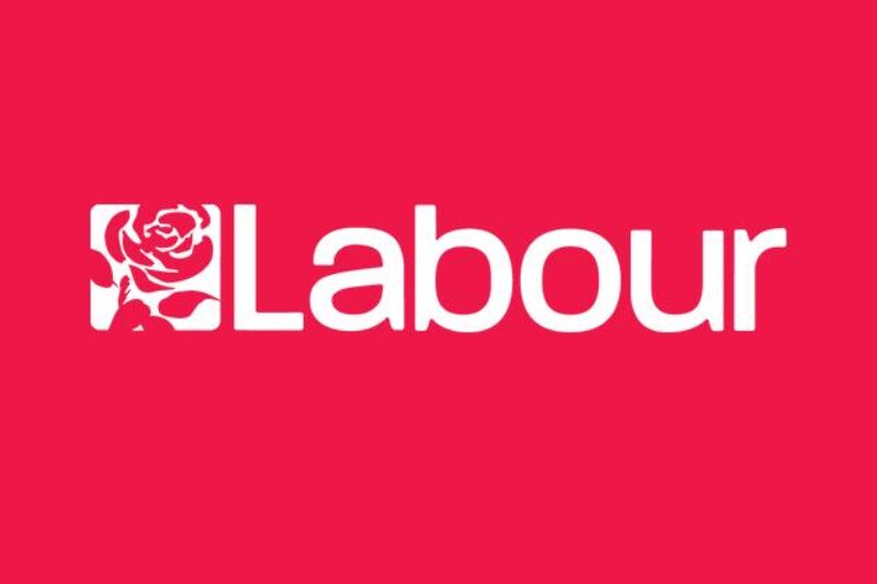 White Labour logo on red background